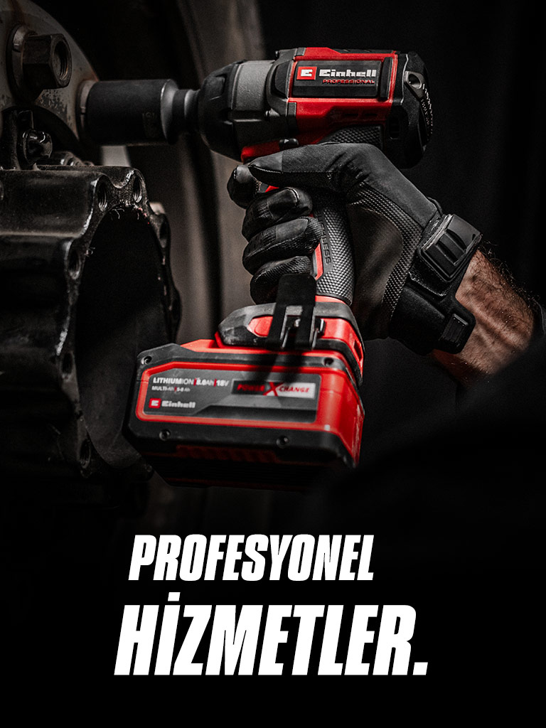 Close-up of a red cordless impact wrench being used on a wheel, with the text "Professional Services".