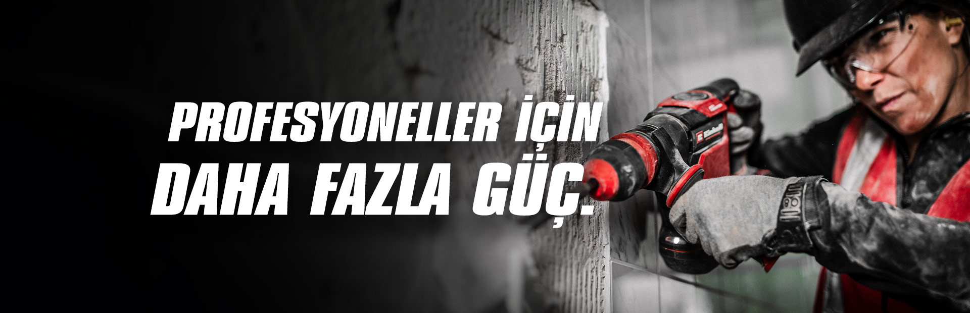 A person wearing safety glasses and a helmet uses a red drill on a wall, with the text "More Power for Pros".