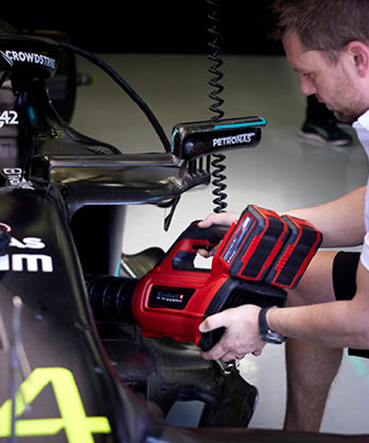 formula 1 car is cleaned with leaf blower